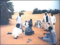 Pessoas no deserto do Sahara