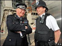 Two policemen chatting to each other