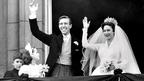 Princess Margaret and her husband, the photographer Antony Armstrong-Jones, wave from Buckingham Palace on their wedding day, 6 May 1960.