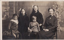 Herberts widow and children ( the photo of herbert is on a pendant around Mary Ann's neck)