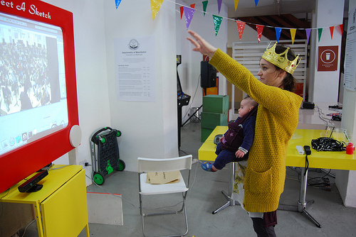 The young and the older get there chance to conduct the virtual orchestra