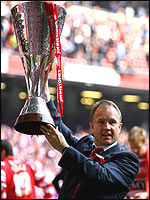 Manager Sean O'Driscoll with the trophy