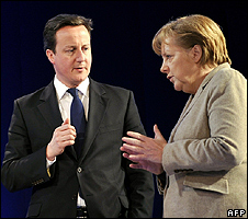UK Prime Minister David Cameron with German Chancellor Angela Merkel in Davos, 28 Jan 11