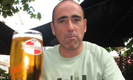 Apres surf … Londonder Ian parkinson finds the cure to a post surfing thirst. Basque Country autumn 06. Pic:m