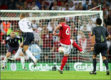 Pander power: Germany's Christian Pander hammers home the winner at Wembley