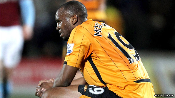Steven Mouyokolo of Hull City looks dejected after defeat by Aston Villa