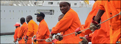 Workers hauling a fibre optic cable onto shore in Kenya