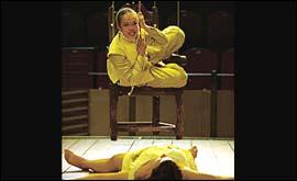 Ariel hangs over Miranda, caught in a spell 