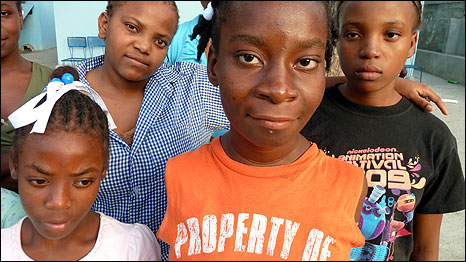 Dieumene Cloristin (in the orange t-shirt)