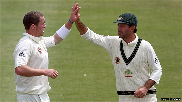 Peter Siddle and Ricky Ponting celebrate a Sussex wicket