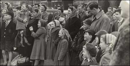 Crowds gather.