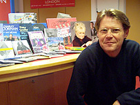 Robert Elms with some of the celebrity books, cds, photos and autographs