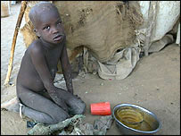 A refugee child forced to live in a makeshift camp