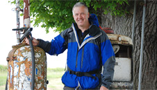 Derek by the oak tree and old petrol pumps