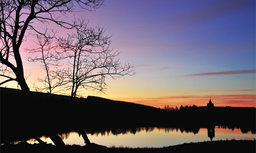 Sun rise over Upper Neuadd reservoir by Roger Roberts.

