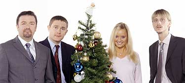 Ricky Gervais as David Brent, Martin Freeman as Tim, Lucy Davis as Dawn and Mackenzie Crook as Gareth in The Office