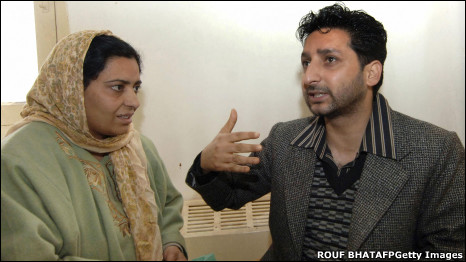 Dr Arshad Hussain with a patient