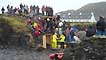 Competitors and spectators at the Stone-skimming championships, Easdale