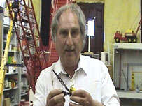 Bev Hitchcock holding a crane