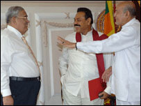 Minister Bandaranaike (L) with President Rajapaksa