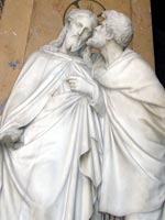 Statue of Judas betraying Jesus with a kiss