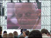 Pope Benedict XVI on a big screen