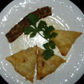A typical 'fast-breaking' Ramadan meal of vegetable samosas and a kebab