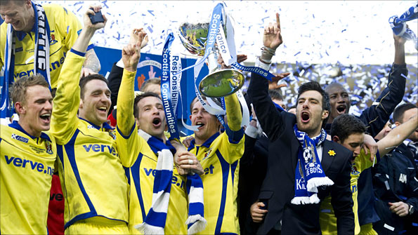 Kilmarnock players celebrate winning the Scottish Communities League Cup