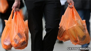 Person carrying shopping bags