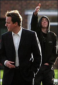 Florence points 'gun finger' at Cameron [pic: PA]
