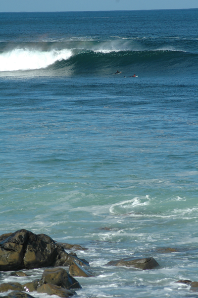 Mark, inside, and gareth swim outside a cranking point break. Pic: Jay Sept 06 