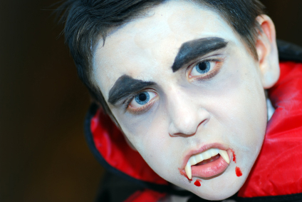 Boy dressed as Dracula