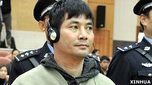 糯康在雲南昆明法院聽取二審裁決(新華社圖片26/12/2012)