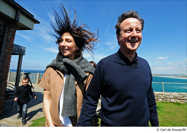 Conservative Party leader David Cameron, right, and his wife Samantha walk in Newquay, Cornwall