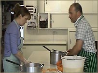 Sam and Greg Haddon chopping vegetables
