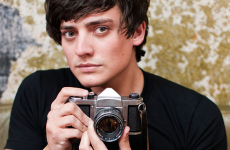 Aneurin Barnard holding a Pentax camera. Photo: BBC/Kudos