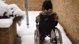 Liz wheeling her way through the snow
