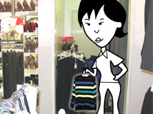 Helen in a clothes shop holding a jumper