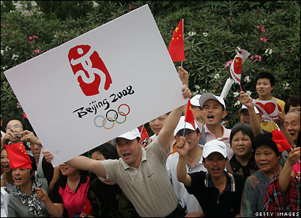 The Olympic torch relay passes through Nanjing, China, on 27 May