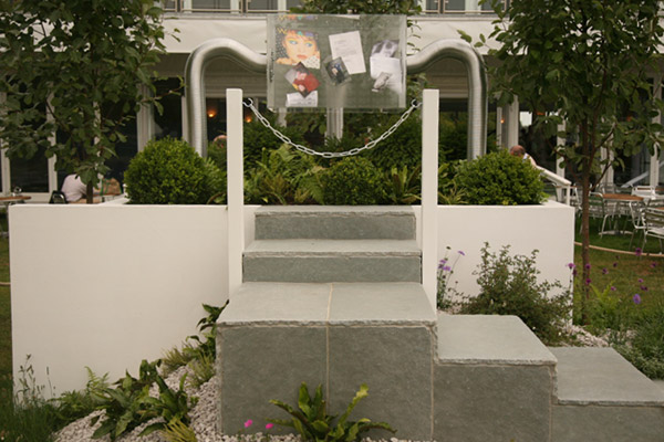 White beam trees evoke high altitude ecology, whilst box and asplenium fern nestle around Nigel's box of private information