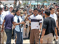 The weapons are being handed over to international monitors.