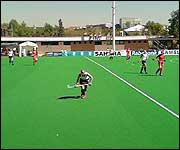 Chloe chases after the ball aginast China