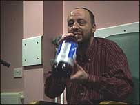 Man drinking Superstrength can