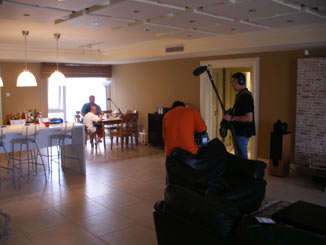 The crew filming a family.