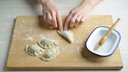 Shaping homemade dumplings