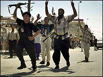 Membros de milícia iraquiana em Najaf