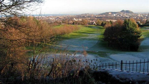 Frosty golf course with Edinburgh skyline beyond