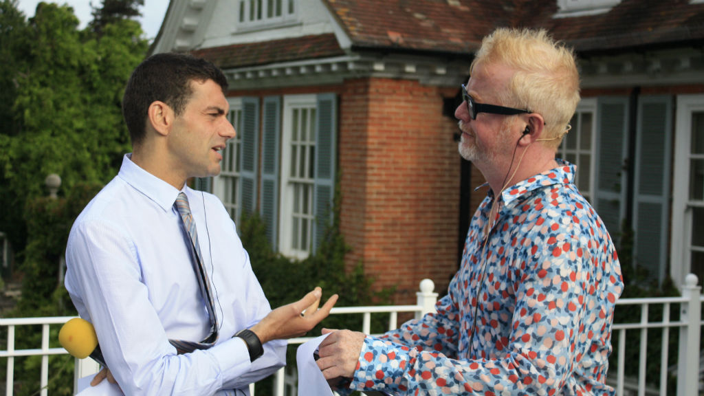 Vassos looks concerned about Chris' run in with a pothole en route.