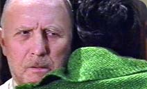 George looks a bit unsure as Alice hugs him