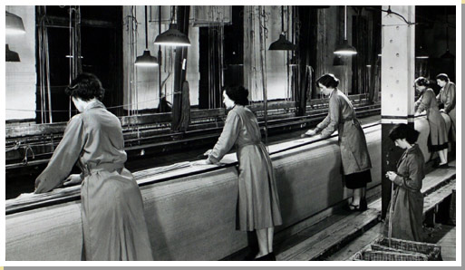 Weaving the Coronation carpet on a 33 feet wide loom 1953.